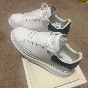 White with blue leather back men’s Alexander McQueen sneakers